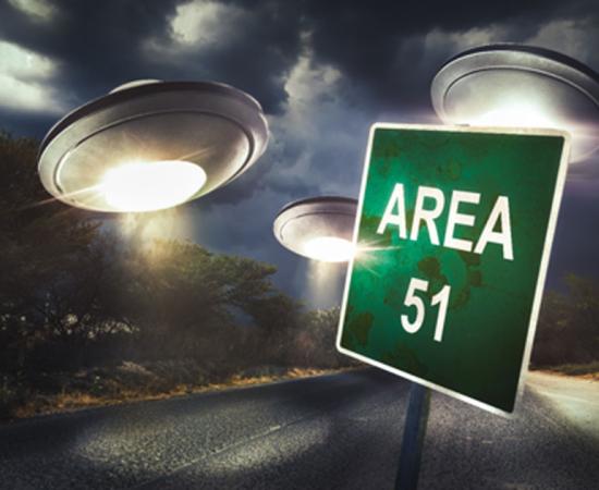 Area 51 sign on a road with dramatic lighting. Source: fergregory /Adobe Stock