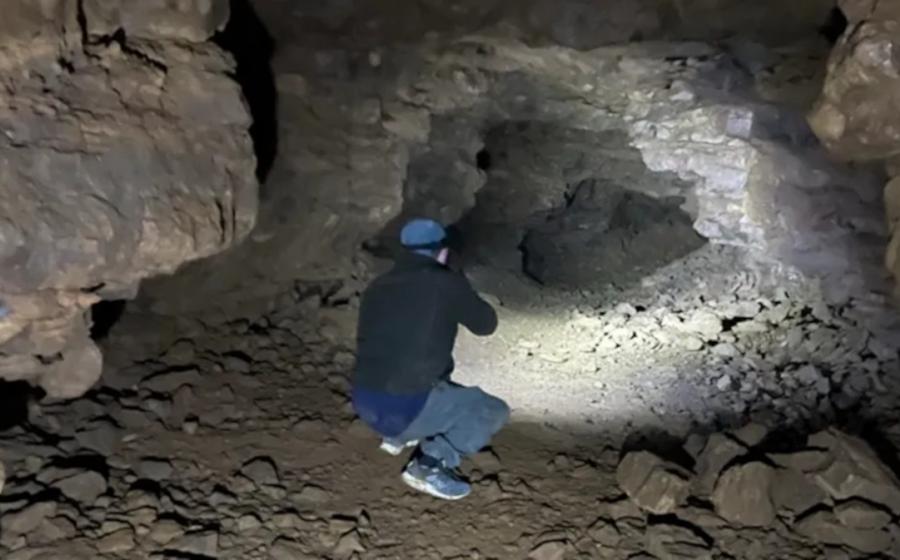 A member of the Bloxham Underground Tunnel Society explores one of the newly discovered passages. 
