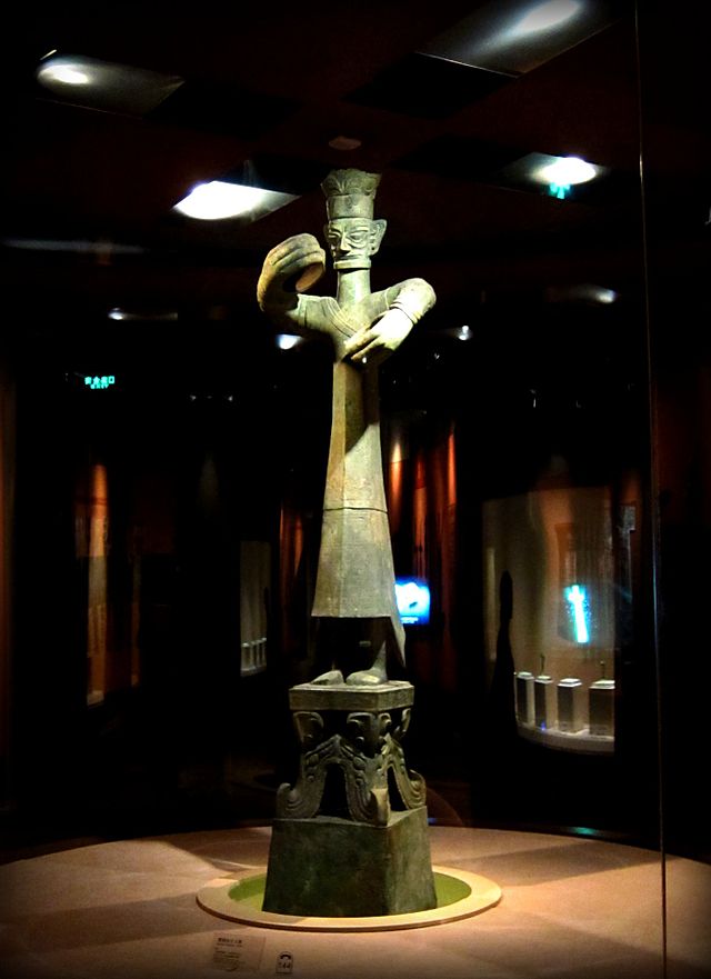 An upright bronze figure representing the high priest of Sanxingdui. (Wikipedia)