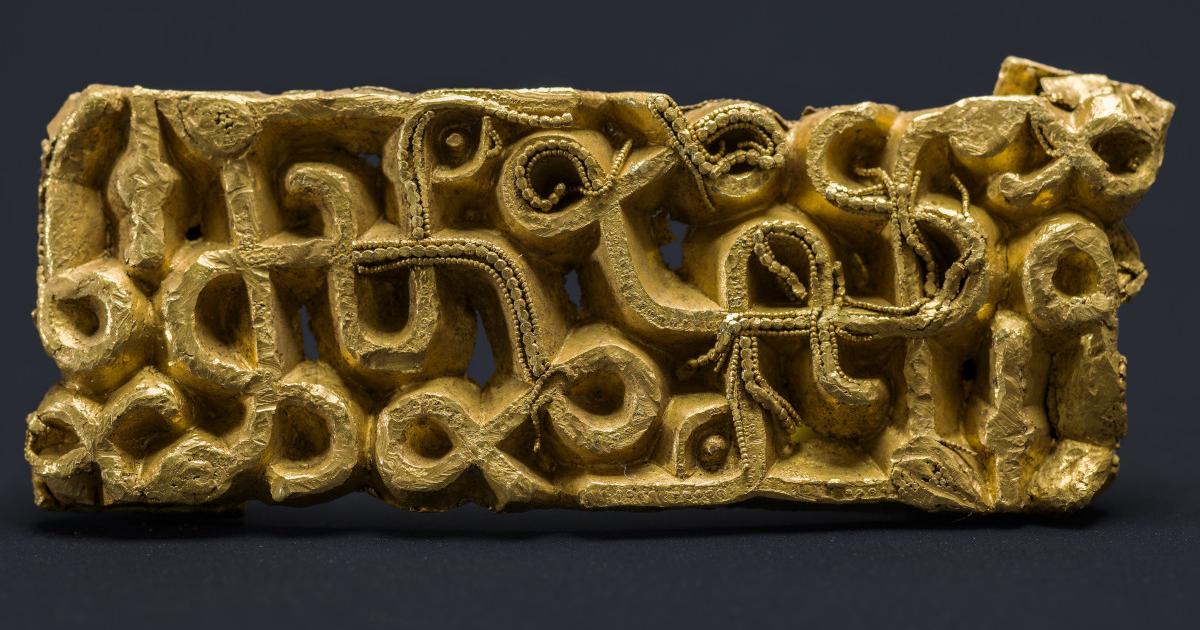 The richly decorated 1,500-year-old gold sword scabbard fitting.