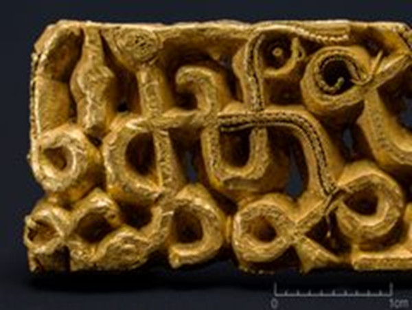 The richly decorated 1,500-year-old gold sword scabbard fitting discovered in southwest Norway.