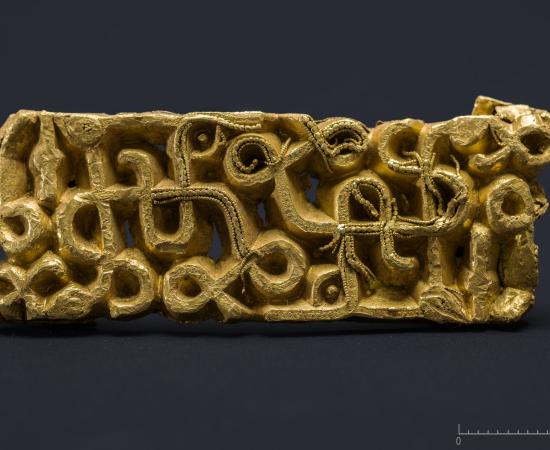 The richly decorated 1,500-year-old gold sword scabbard fitting.