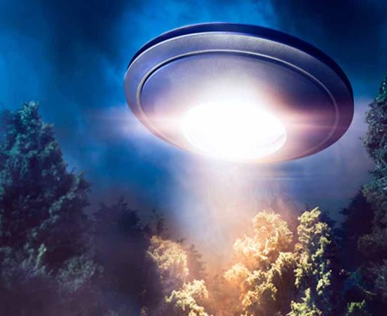 Representational image representing a UFO flying over Rendlesham Forest in Suffolk. Source: fergregory / Adobe Stock